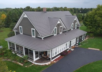 Grey Rustic Shingle Roof on a Grey House