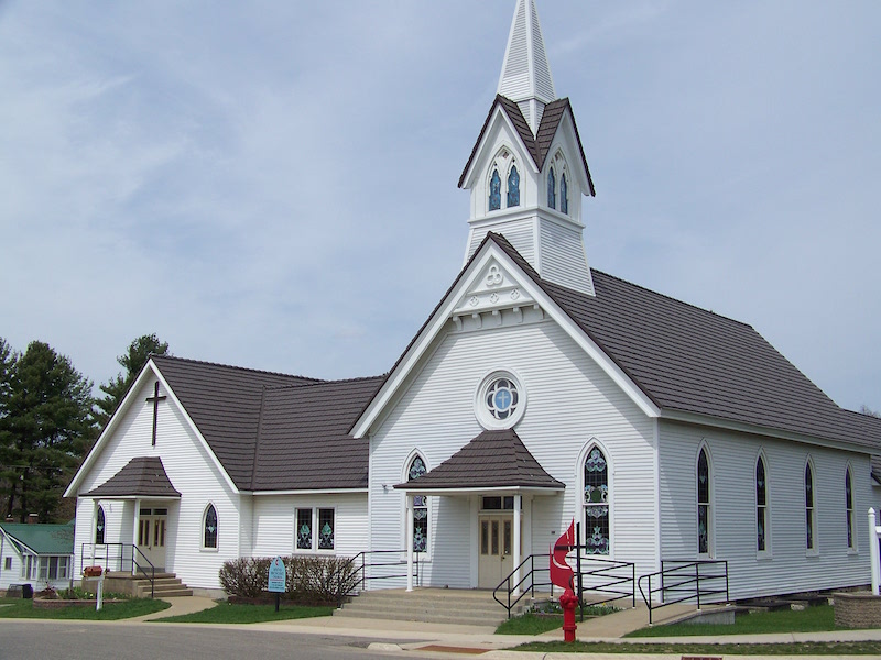 Metal Shingle Roof on a Beautiful White Church with Steeple