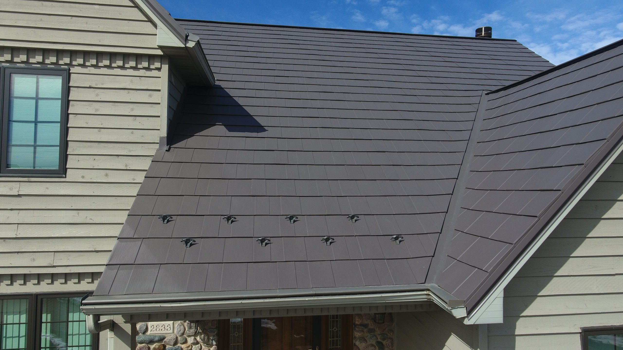 Up close view of a dark brown oxford shingle roof