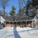 House with Metal Roof Made for Snow